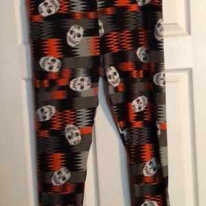 TC Halloween leggings, 92% poly 8% spandex.